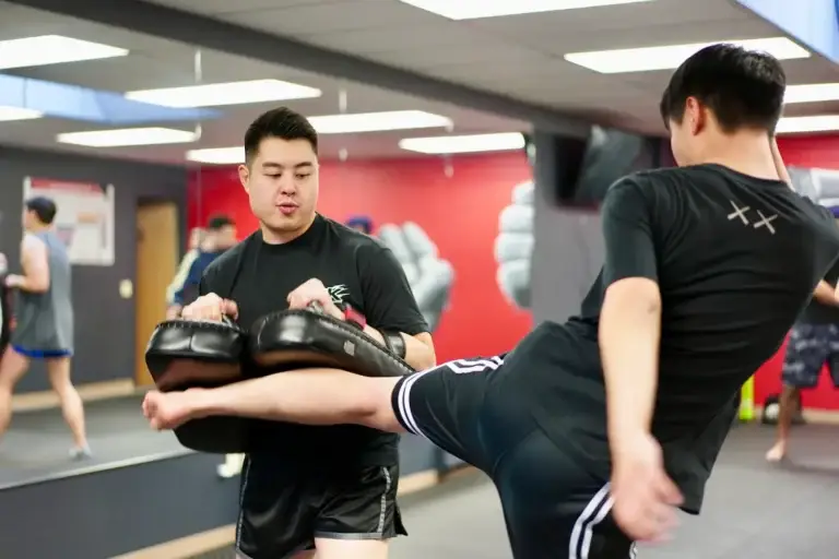 kickboxing-class-pad-work-richmond-vancouver-art-of-kickboxing